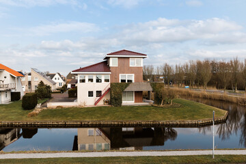 Fototapeta na wymiar Modern residential buildings in Hindeloopen, Netherlands, Europe