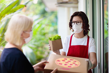 Pizza delivery in lockdown. Take away food.