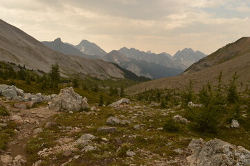 Hiking, climbing and camping on the Mount Assiniboine mountain in the Rockies between Alberta and British Columbia in Canada