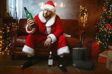 Bad Santa claus celebrate christmas with bottle