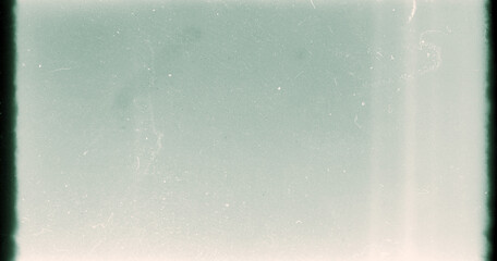 Noisy film frame with heavy scratches, dust and grain
