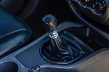 automatic transmission shift selector in the car interior. Closeup a manual shift of modern car gear shifter.