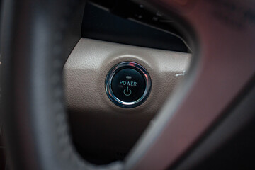Close up engine car start button. Start stop engine modern new car button,Makes it easy to turn your auto mobile on and off. a key fob unique ,selective focus
