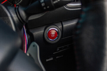 Close up engine car start button. Start stop engine modern new car button,Makes it easy to turn...