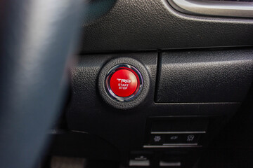 Close up engine car start button. Start stop engine modern new car button,Makes it easy to turn...