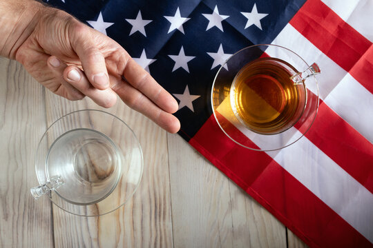 concept of battling each other in US Presidential Election. Two glasses opposite each other on background of American flag - Powered by Adobe