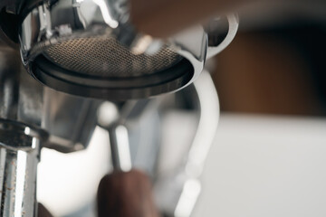 Closeup detail shot of coffee machine with walnut wood handles