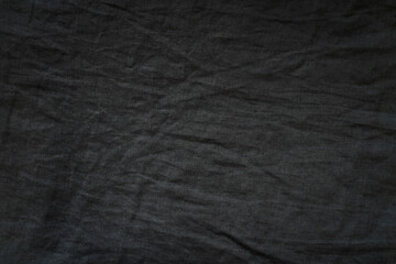 crumpled black linen cloth background
