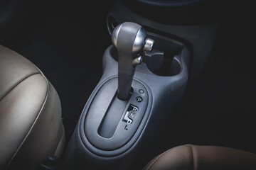 automatic transmission shift selector in the car interior. Closeup a manual shift of modern car...