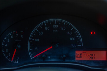 Fototapeta premium Car​ dashboard​ modern​ automobile control​ illuminated panel​ speed display.