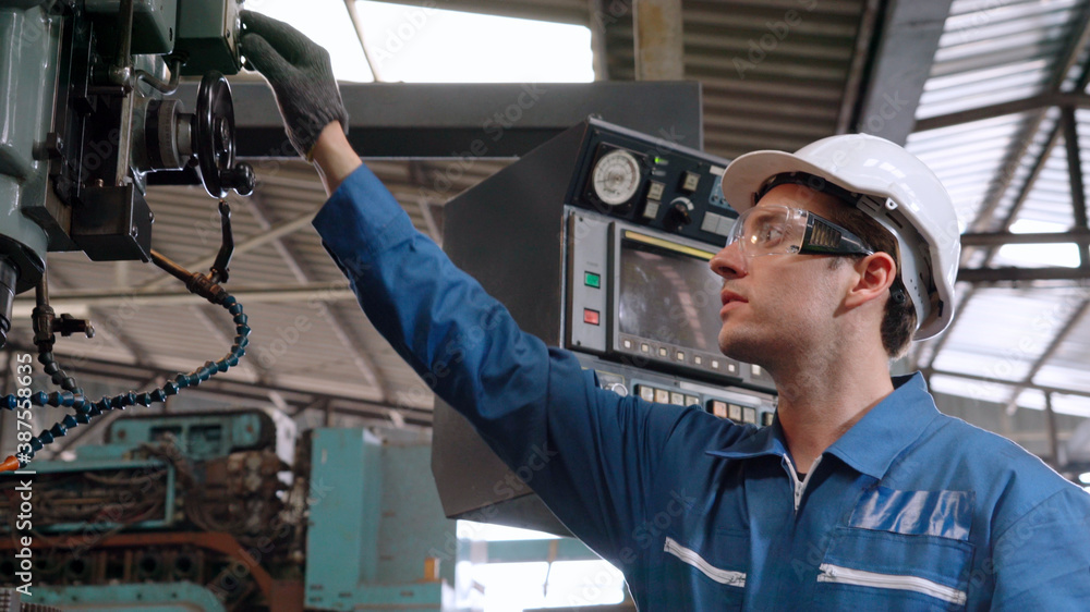 Poster smart factory worker using machine in factory workshop . industry and engineering concept.