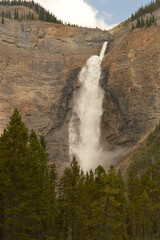 The turquoise Moraine Lake and the waterfalls and nature of the Rocky Mountains in British...