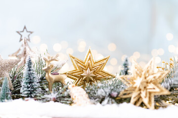 Fototapeta na wymiar Christmas ornament with string lights on blue background.