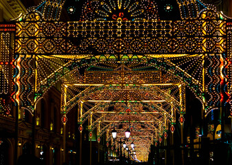 Obraz premium Festive illumination on city street. Venetian style.
