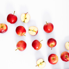 Fresh red apple. Creative fruit pattern. Red apples on white background. Flat lay, top view, copy space