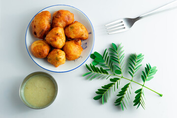 Fresh mysore bonda in a plate on a white background