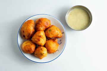 Fresh mysore bonda in a plate on a white background