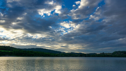 Sunset on a lake with clouds