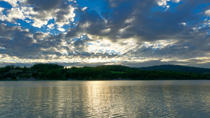 Sunset on a lake with clouds