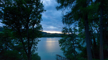 Sunset on a lake with pontoon