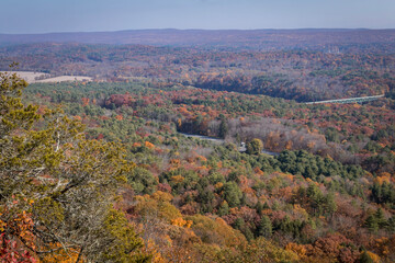 The Milford Bridge from a scenic overlook surrounded by brilliant fall foliage