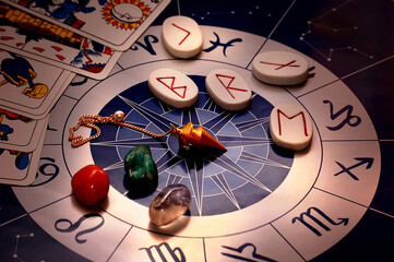 esoteric tools magic pendulum, runes, gemstones, healing stones, tarot cards and horoscope like...