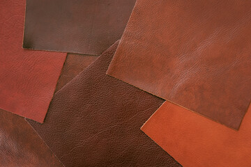 Various samples of genuine leather samples of different colors, brown shades for choice....