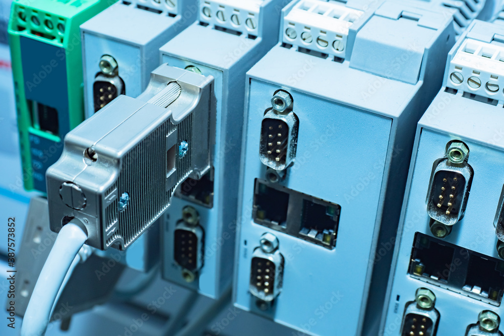 Poster panel with connectors for connecting to a computer. rear panel of built-in computer. close-up of com