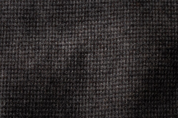Grey cotton texture background. Detail of sweater fabric surface.