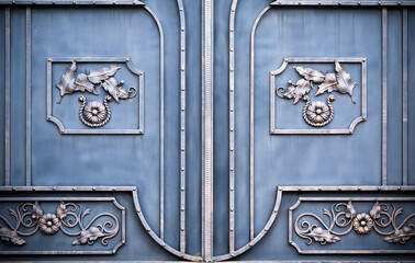 Wrought-iron gates, ornamental forging, forged elements close-up.