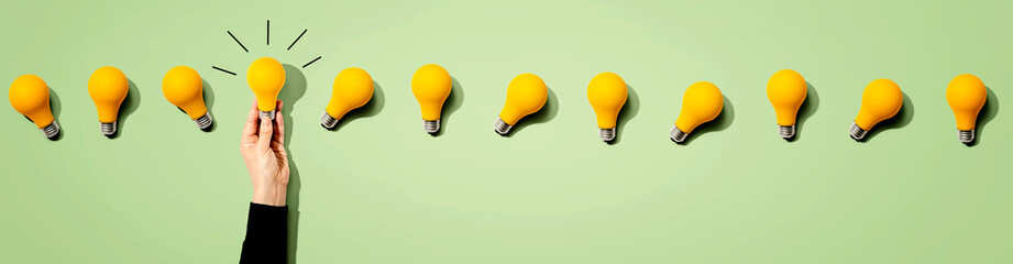 Many yellow light bulbs - Idea and creativity theme