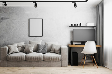 Blank frame in modern interior with gray concrete wall, gray sofa, home workplace with PC and white chair, 3d rendering