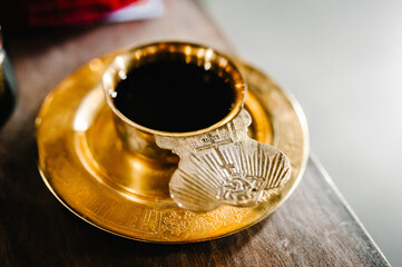 Holy communion on wooden table on church. Taking Communion. Cup of glass with red wine.
