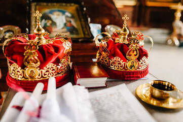 Wedding crowns. Wedding crown in church ready for marriage ceremony. close up. Divine Liturgy.