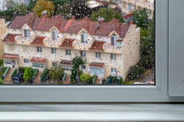 windowsill and Falling rain drops background
