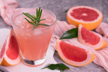 Grapefruit drink with ice.
Close-up.