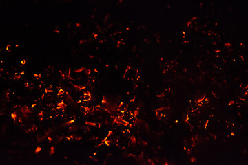 Fototapeta na wymiar Burning embers of a campfire