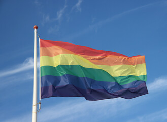 rainbow flag on sky