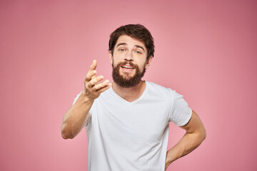Fototapeta premium cheerful bearded man white t-shirt emotions cropped view pink background