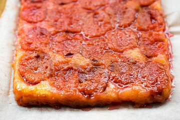 Plum tarte tatin, rectangle shape with cinnamon 