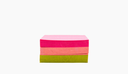 A pack of colorful sticky note papers against a white background.