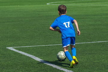 A young football player boy was injured in the game.