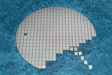 High-power transistor chip on a silicon wafer.
