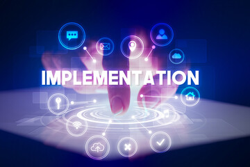 Finger touching tablet with web technology icons and IMPLEMENTATION inscription, web technology concept
