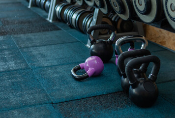 Kettlebell and dumbbells in the gym
