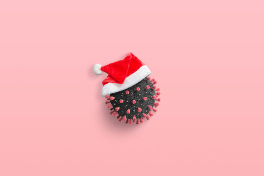 Coronavirus with Santa Claus hat concept
