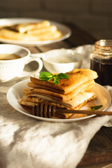 A stack of freshly baked pancakes for breakfast