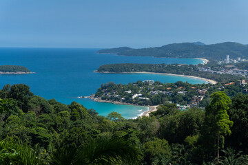 Fototapeta na wymiar The seascape of the cove islet Phuket island Thailand famous tourist destination in the mid summer holiday with the deep blue ocean and clear sky with the mountain full of forest tree as background