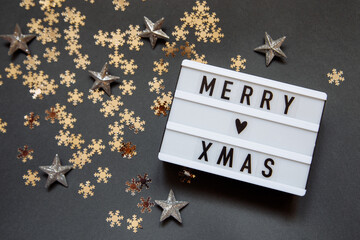 Christmas gray photophone with a sign with the inscription, snowflakes and stars