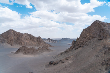 landscape that  clouds over the mountain in desert